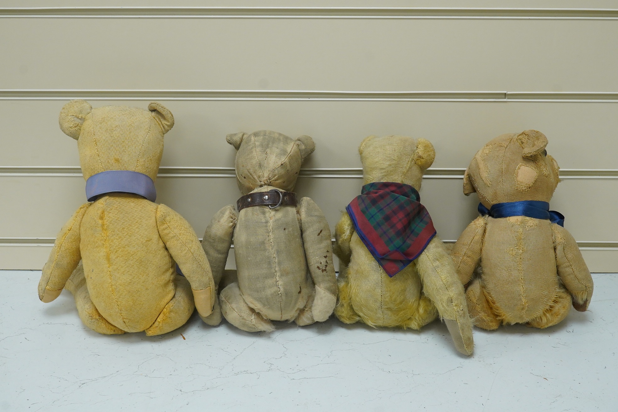 Four bears with restoration and hair loss, two 1920's and two 1950's. Condition - poor.